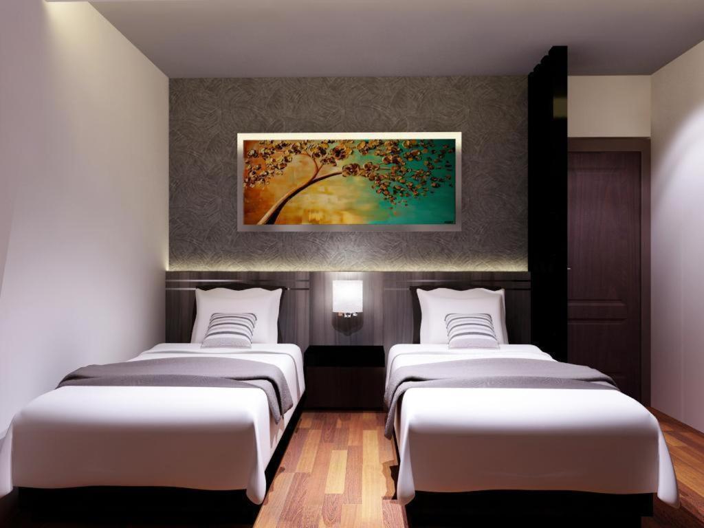 Neotel Hotel City Centre Tanjung Redep Eksteriør billede